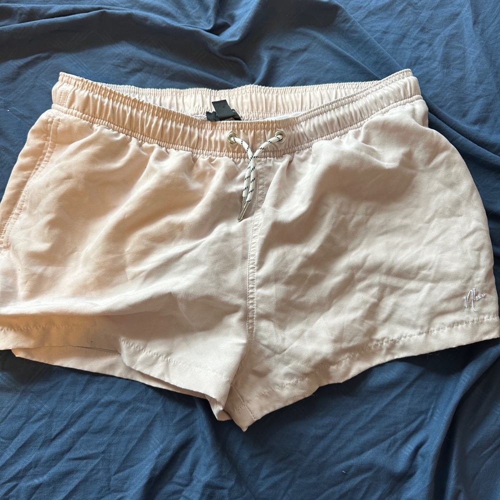 Light pink swim shorts